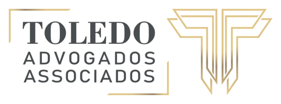 Logo anterior da Toledo Advogados Associados, com moldura e símbolo em linhas finas
